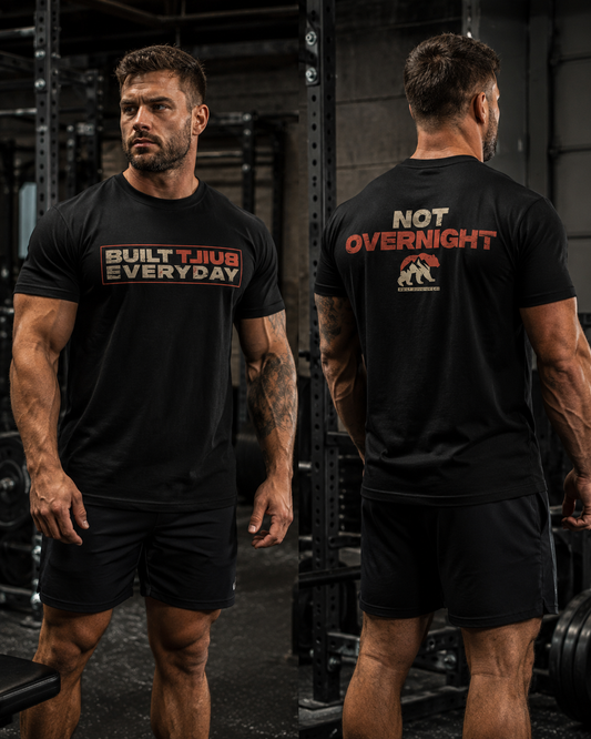 Man wearing The Built Everyday Tee in a gym setting